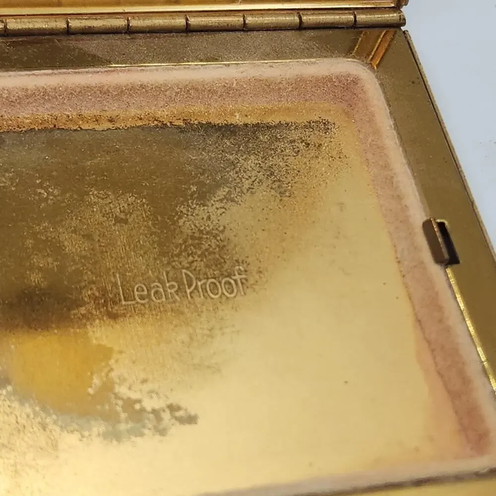 Vintage Volupte Leakproof Compact Needlepoint Look Floral Mirror Gold Tone USA